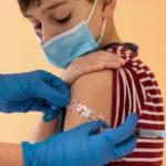 The Impact of Vaccinations on Managing Emerging Infectious Diseases